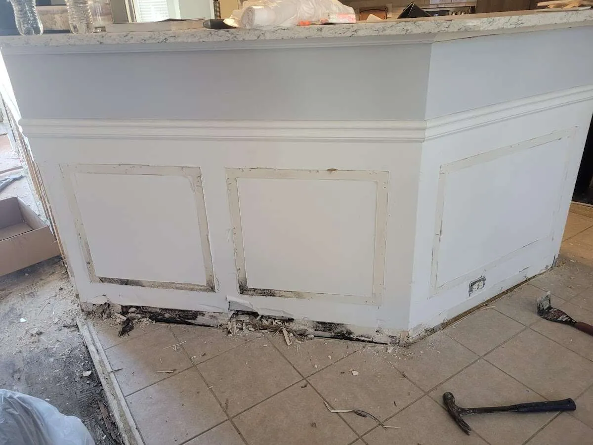 Water damage and mold on kitchen during Storm Damage Restoration in Lake City